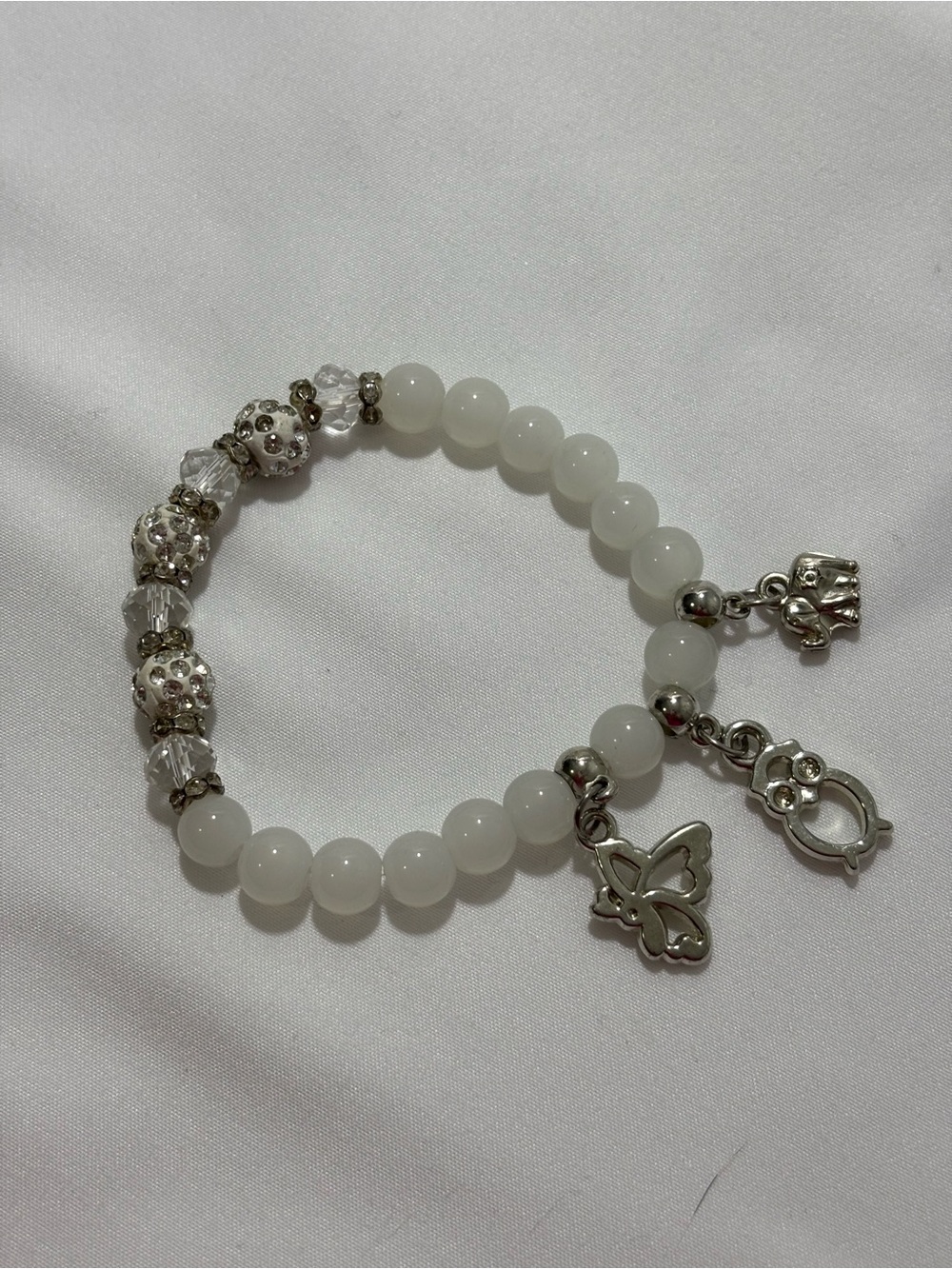 Silver tone White Bead Stretch Charm Bracelet w/ Butterfly & Elephant Charms 3”